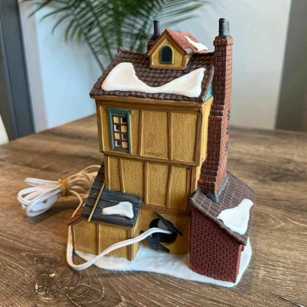 Dept 56 “J. Lytes Coal Merchant” Dickens Village Collection.